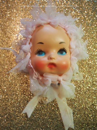 creepy doll face fascinator hat