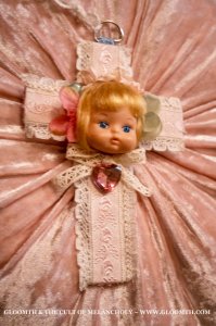 creepy doll cross necklace