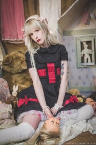 doll girl with red and black dress