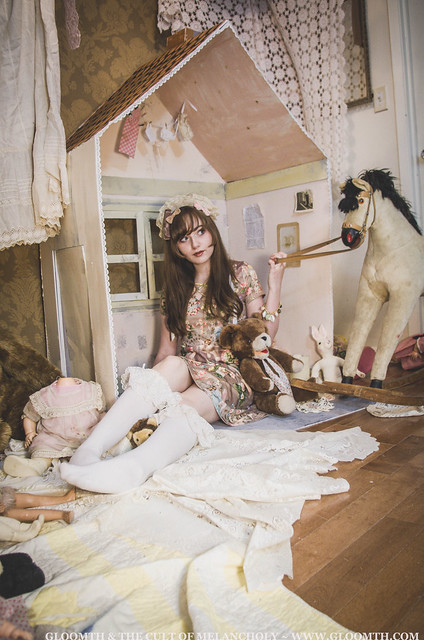 grunge girl with dollhouse
