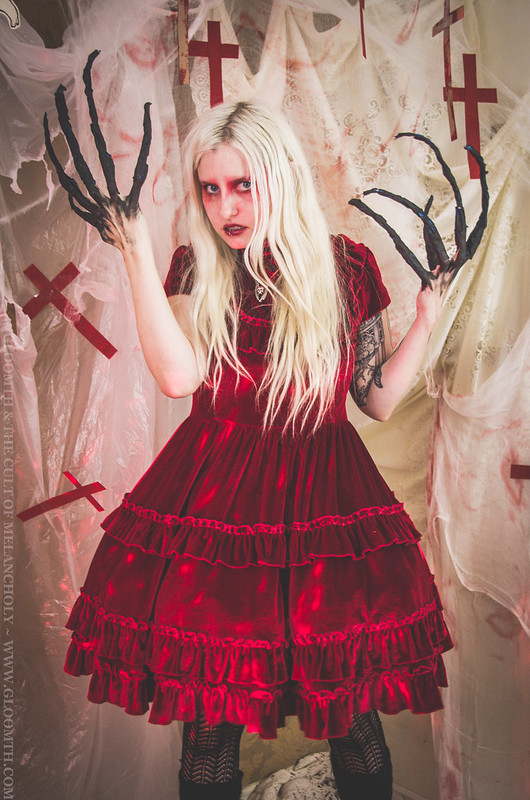 demon girl with claws in red dress