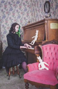 victorian woman playing the piano