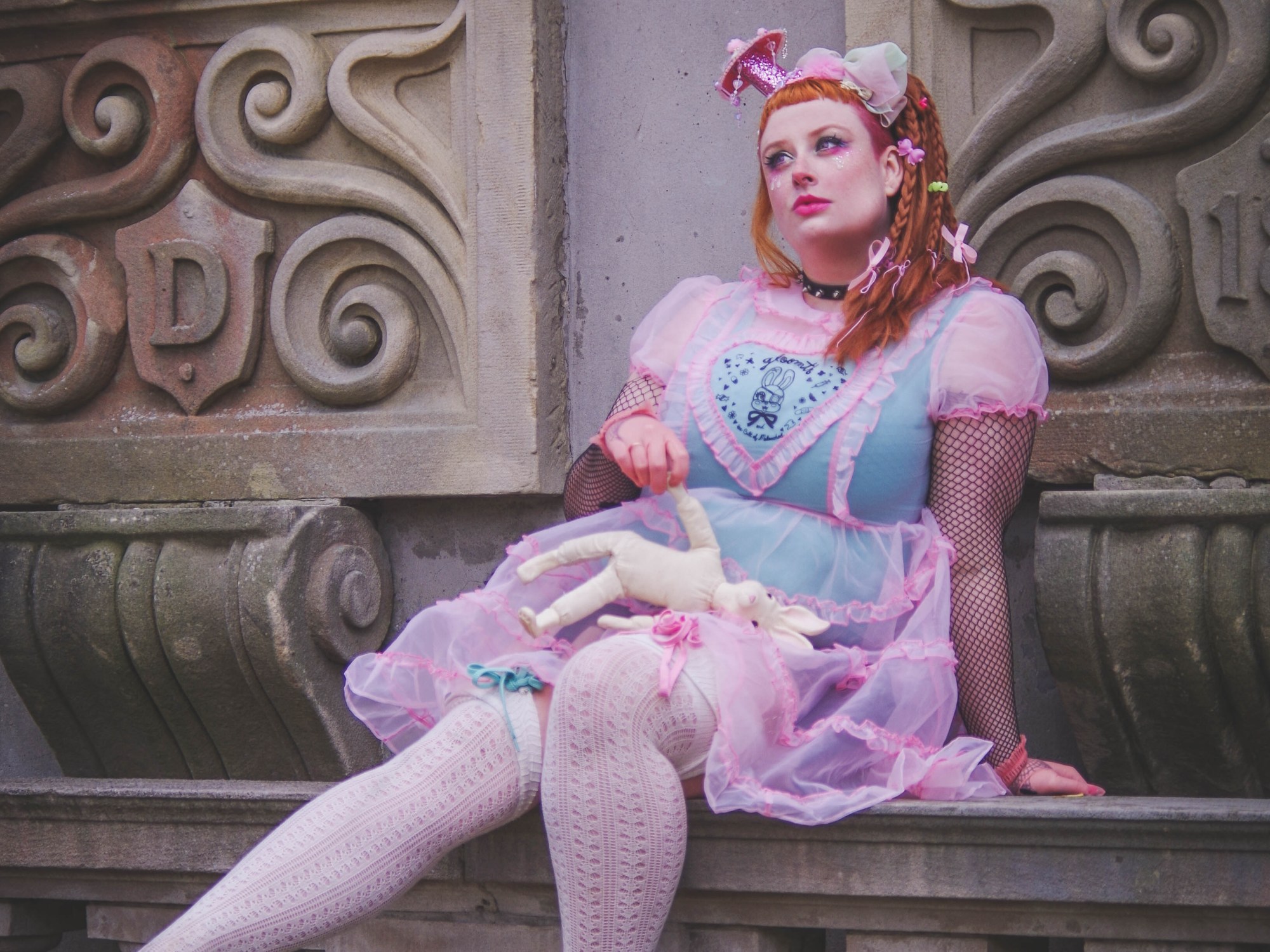 plus size lolita in a sheer pink dress
