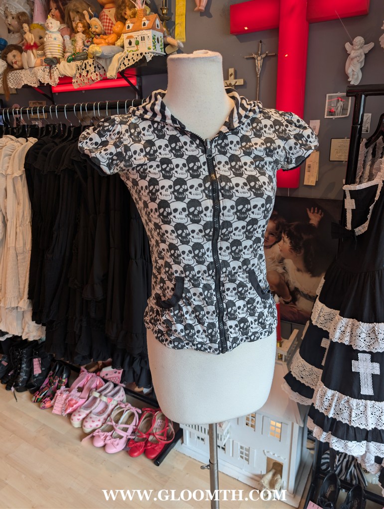 tripp nyc skull hoodie  on display in doll funeral shop toronto