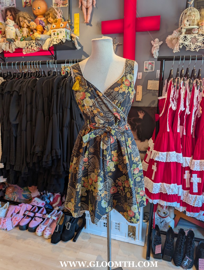 metamorphose kimono print jumperskirt on display at doll funeral shop toronto